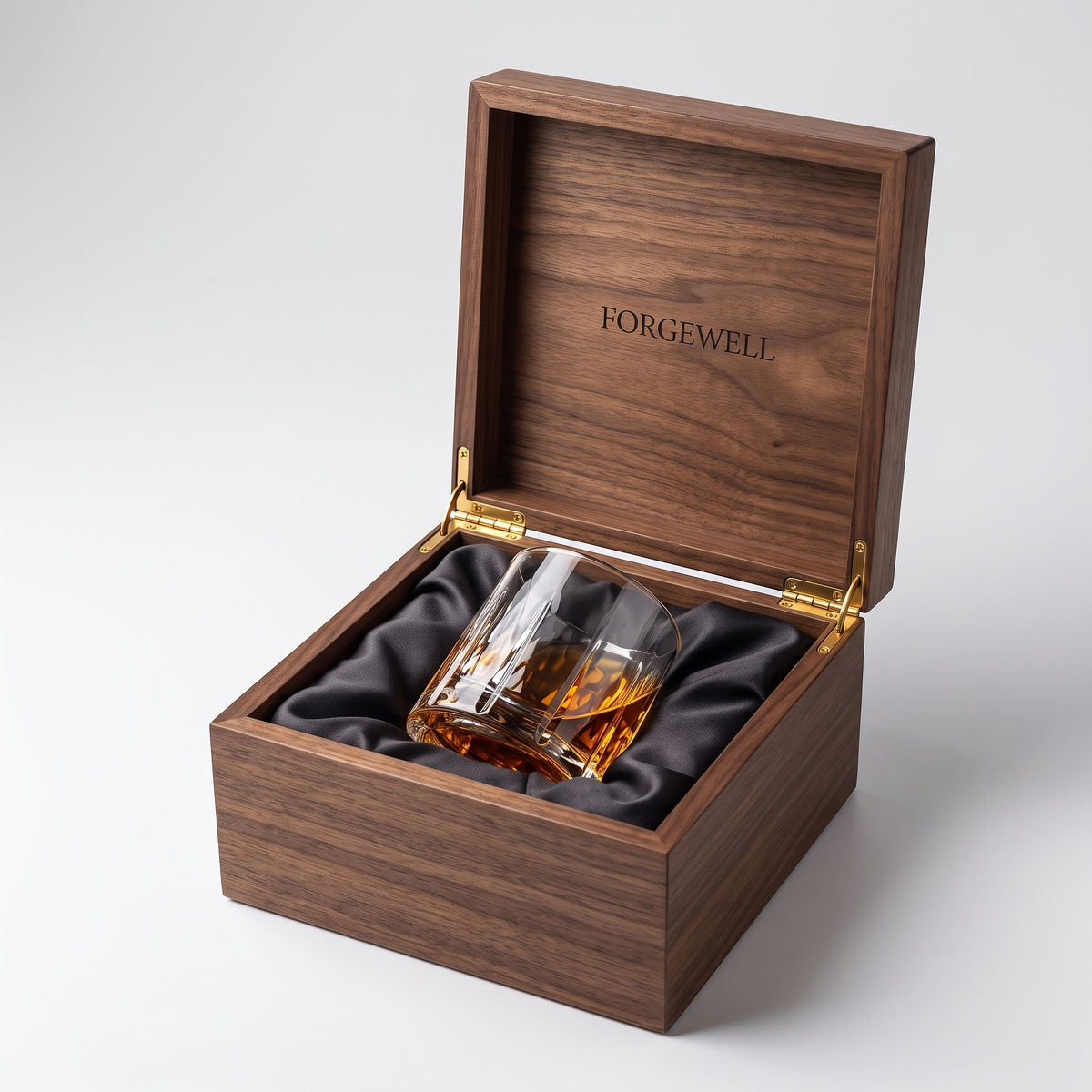 Etched crystal whisky glass in open Forgewell wooden box